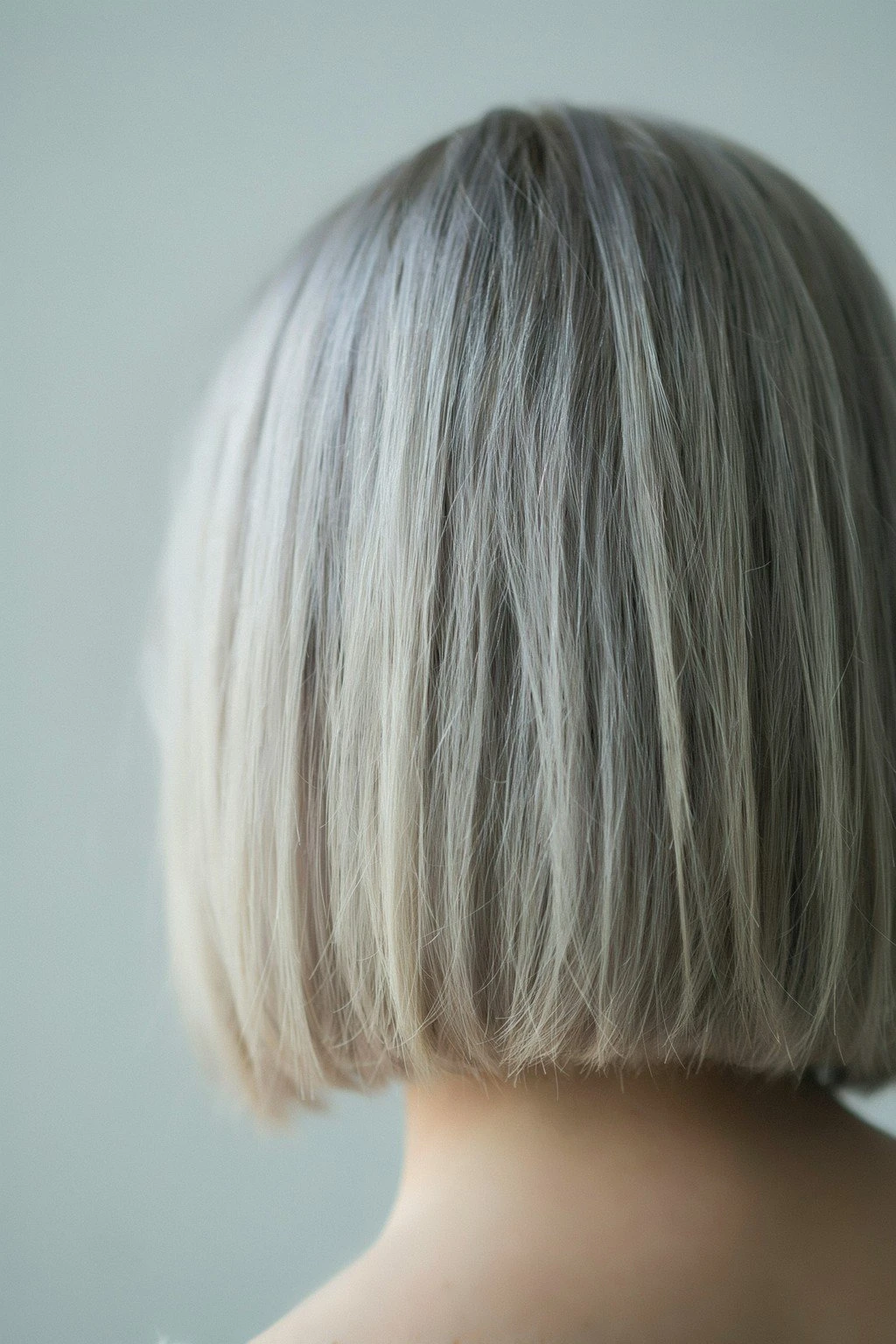 A clean chin-length bob seen from behind, the line crisp at the jaw