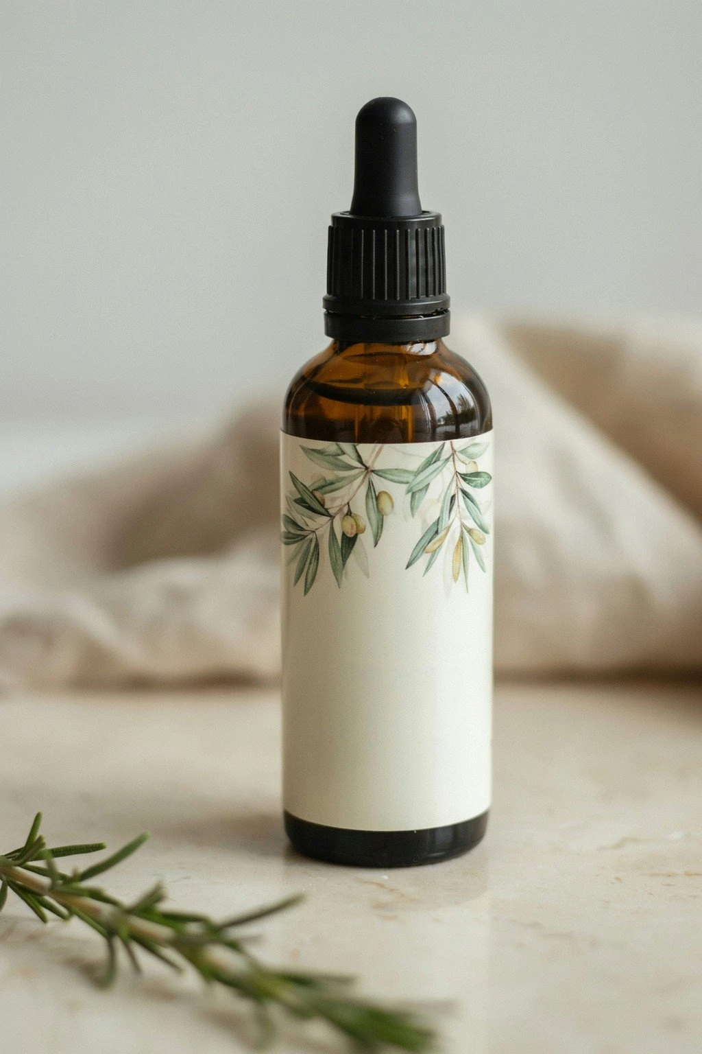 Close-up of hair growth oil bottle label listing botanical ingredients and a growth claim